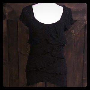 Sexy ruffles for days!  Short sleeve black top.